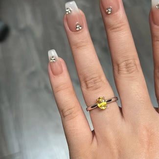 1.02ct Oval Yellow Sapphire Solitaire Engagement Ring