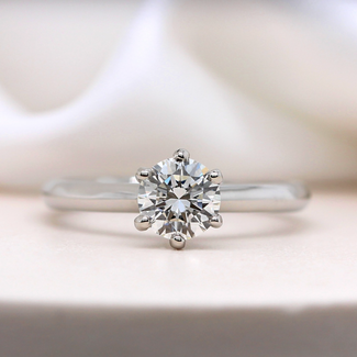 Tulip setting engagement ring top
