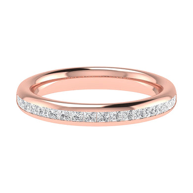 A delicate rose gold Channel Set Princess Cut ring by Holts Gems, featuring a row of sparkling princess cut diamonds set along the top half of the band, displayed on a white background.