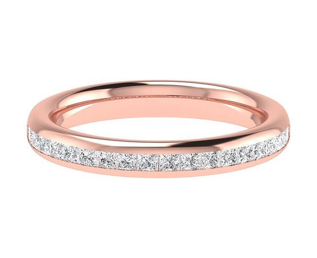 A delicate rose gold Channel Set Princess Cut ring by Holts Gems, featuring a row of sparkling princess cut diamonds set along the top half of the band, displayed on a white background.