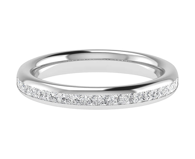 A white gold channel set ring by Holts Gems, featuring a row of small princess cut diamonds set into the band, displayed on a white background.