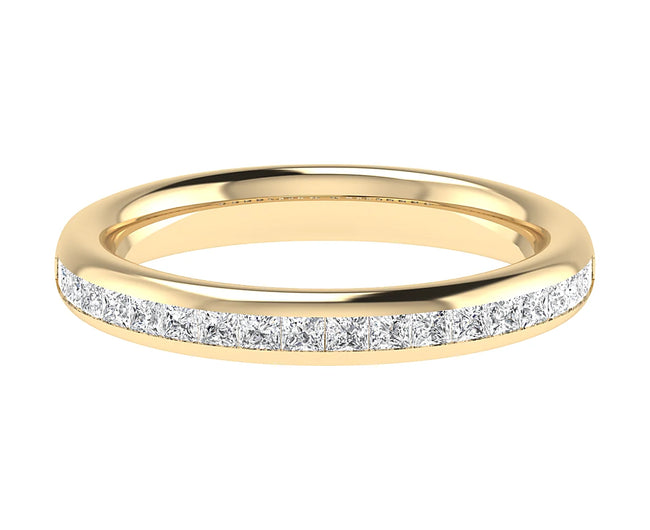 A slim gold band ring by Holts Gems, named “Channel Set Princess Cut,” featuring a row of sparkling princess cut white diamonds channel set along the top for a sophisticated and elegant look, photographed on a white background.