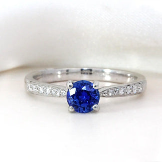 0.62ct Round Blue Sapphire Diamond Band Ring