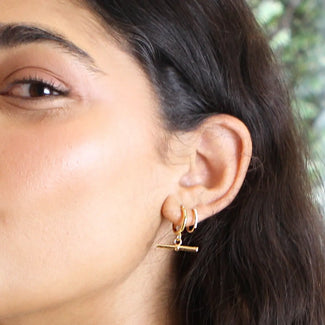 Gold t 2025 bar earrings