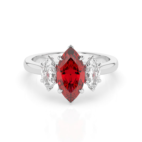 The Ruby Violet ring features a large marquise-cut red gemstone set at its center, elegantly flanked by two smaller marquise-cut clear diamonds on each side. Its secure setting beautifully showcases and protects the stunning gemstones.